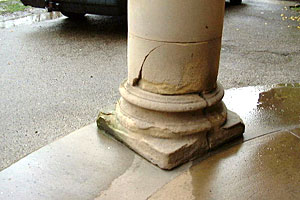 Stone replacement to base of stone pillar